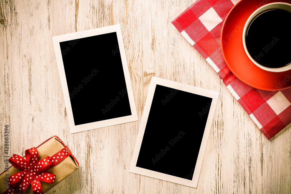 Blank photo frames on table