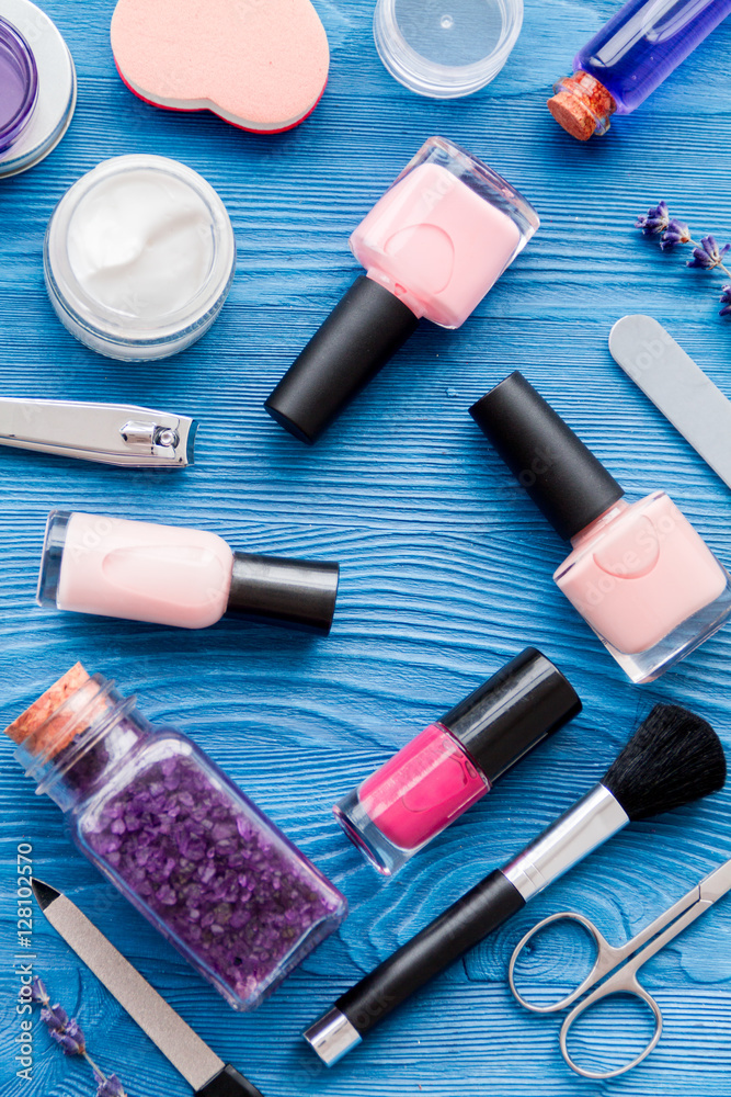 set for manicure and make-up on wooden background