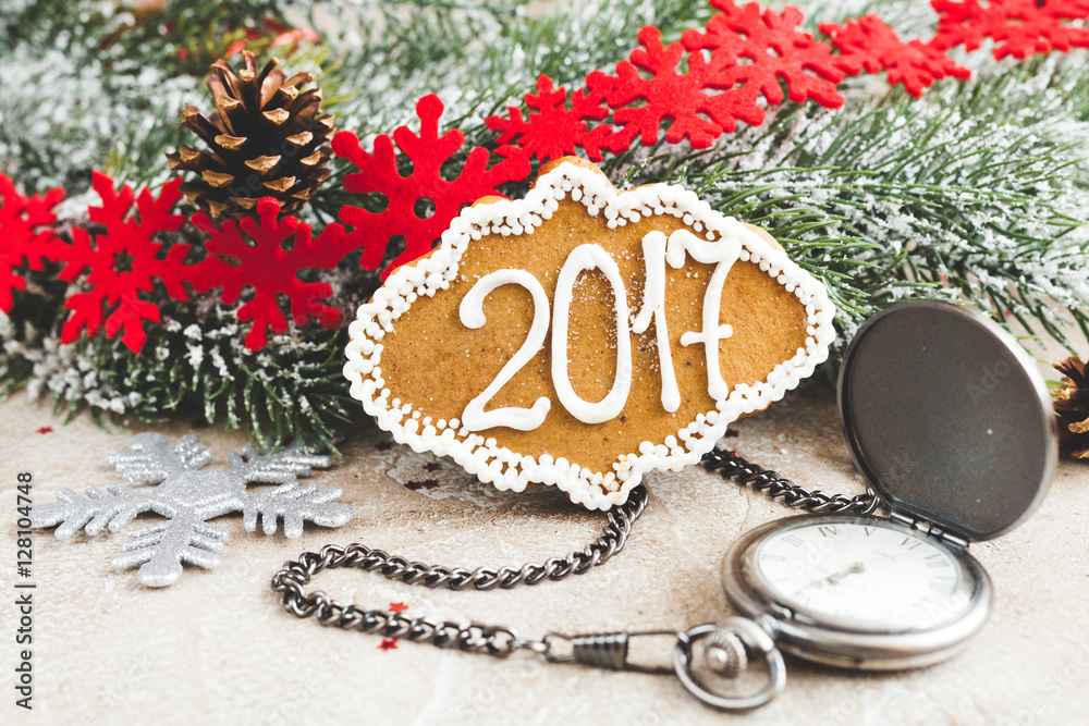 gingerbread and clock on background of christmas toys