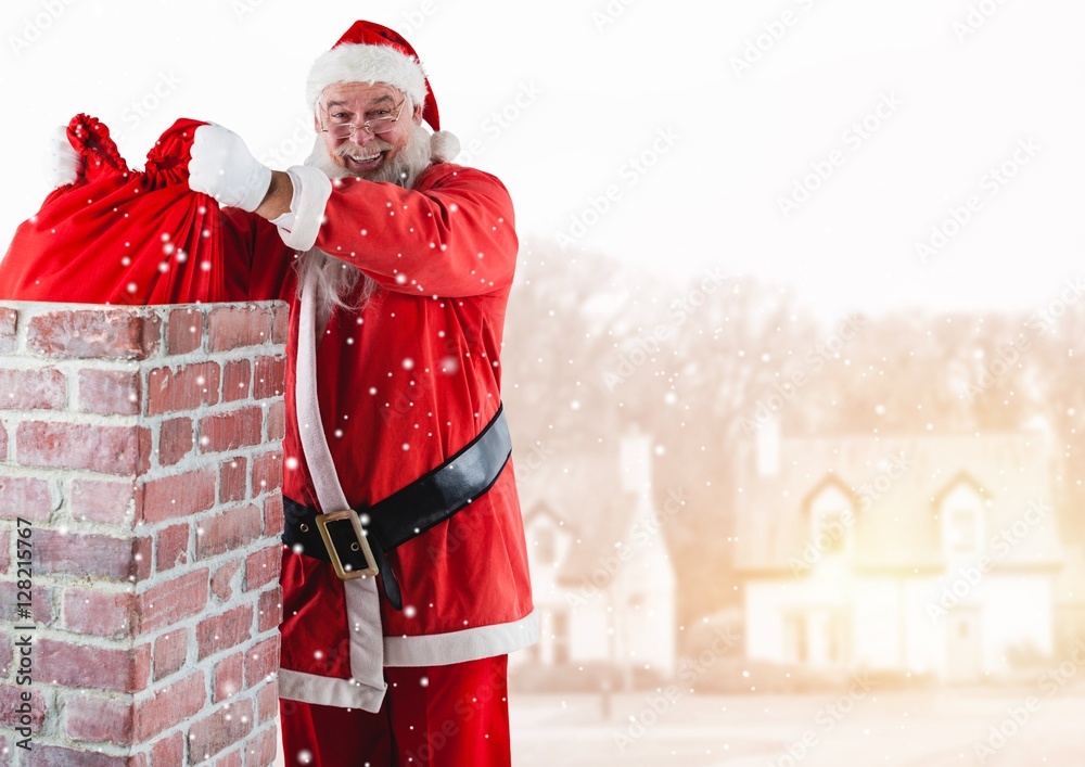 Santa removing gift sack from chimney