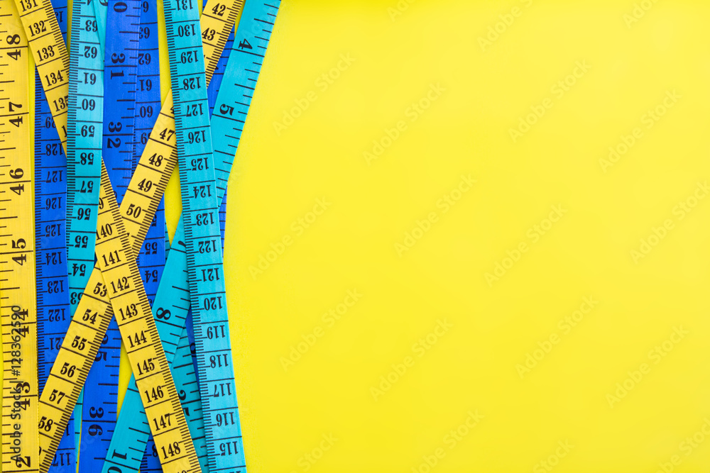 Diet control concept background. Colorful of Measuring tape 