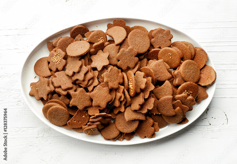 freshly baked gingerbreads on white plate