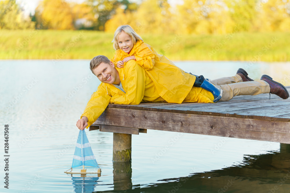 Family in raincoats