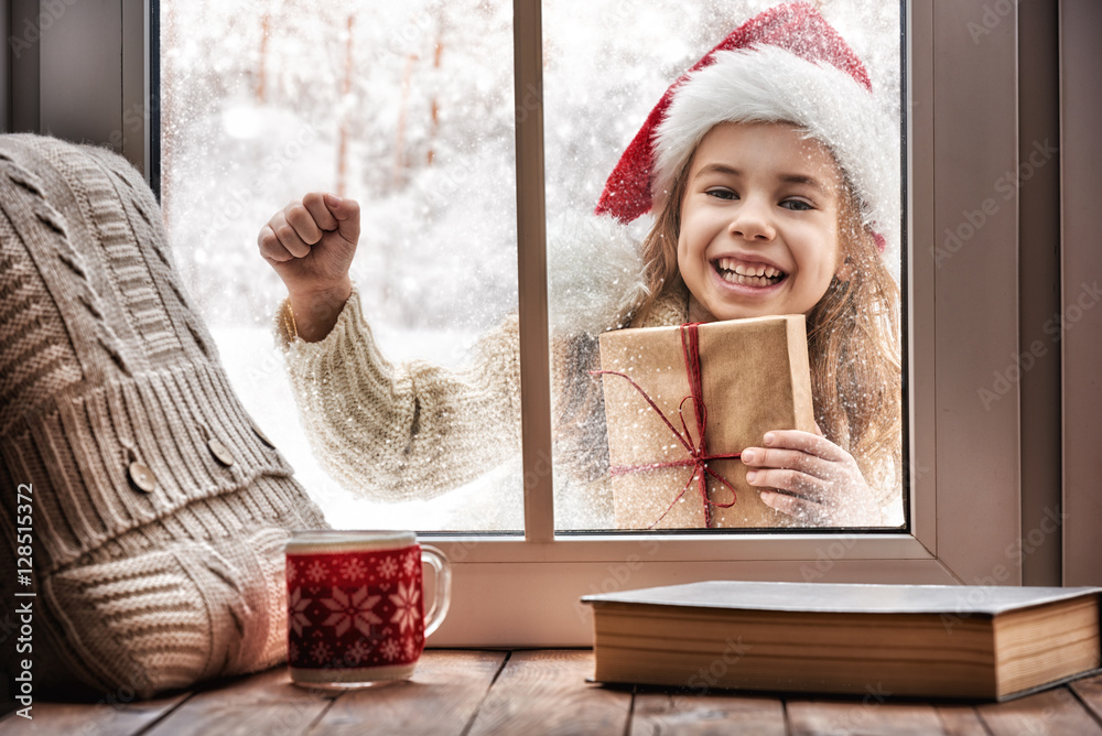 girl looking in window