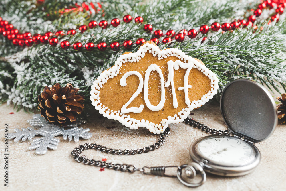 gingerbread and clock on background of christmas toys