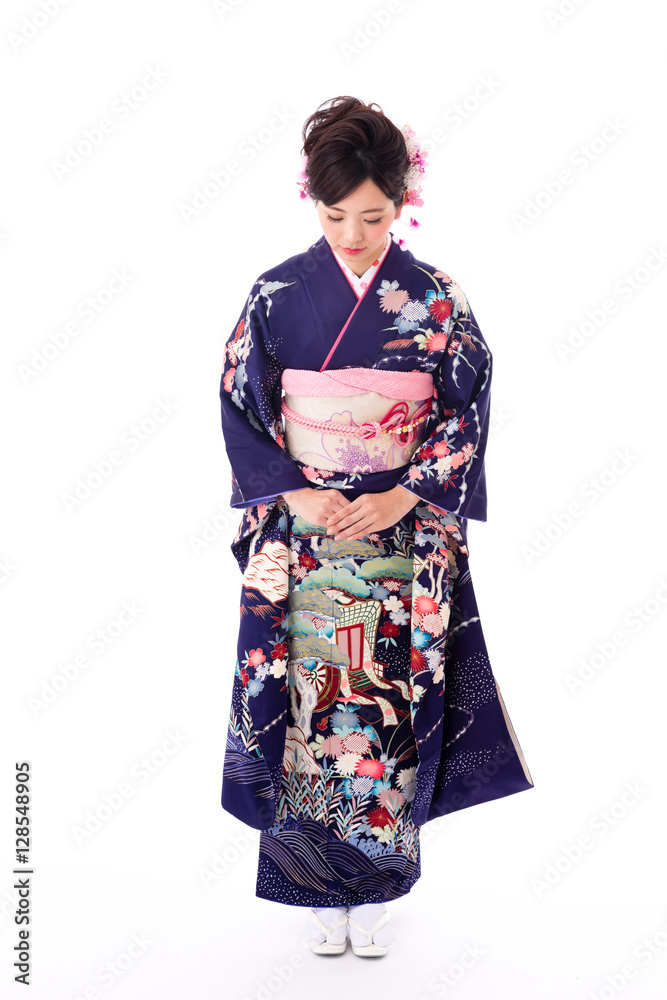 attractive asian woman wearing kimono isolated on white background