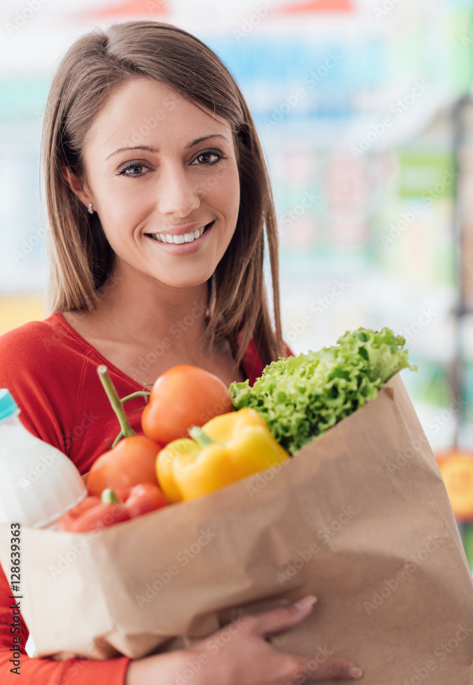 Woman holding a grocery bag