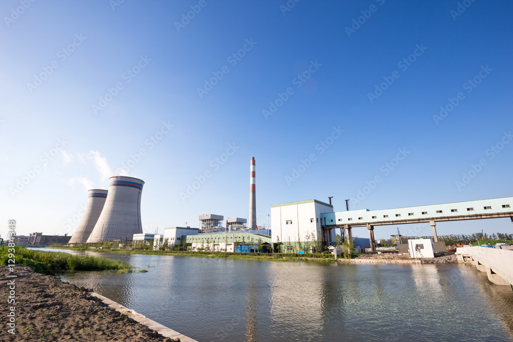 modern power plant near water