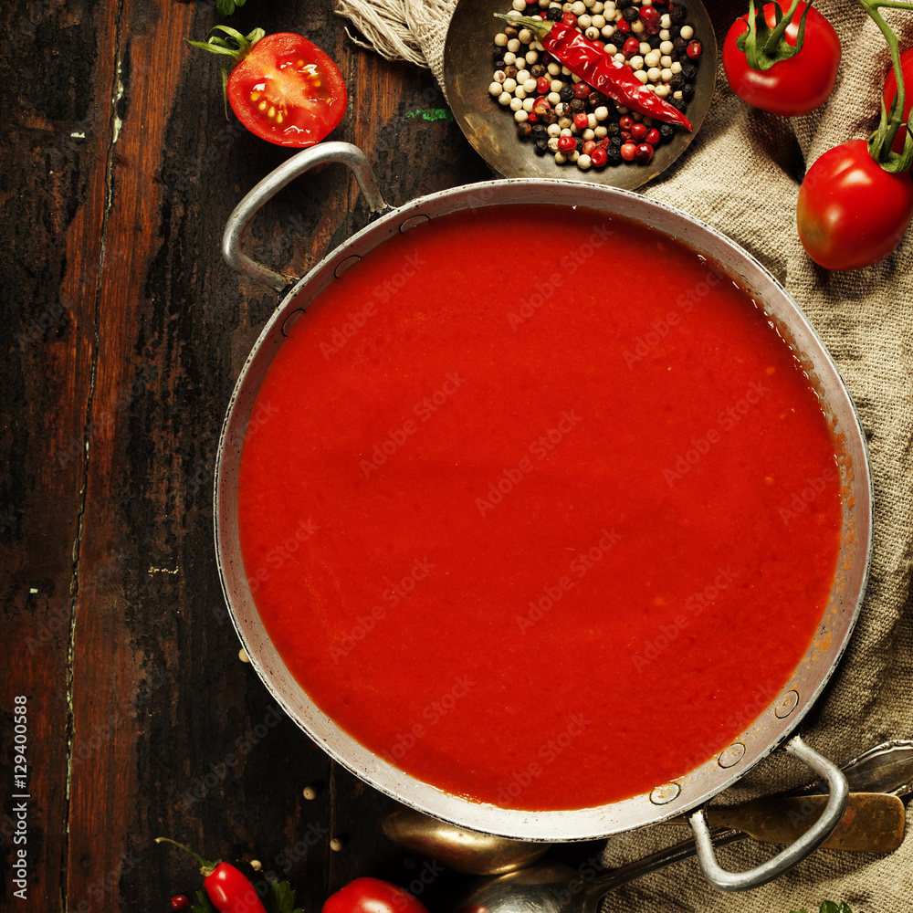 Homemade Tomato soup on wooden table