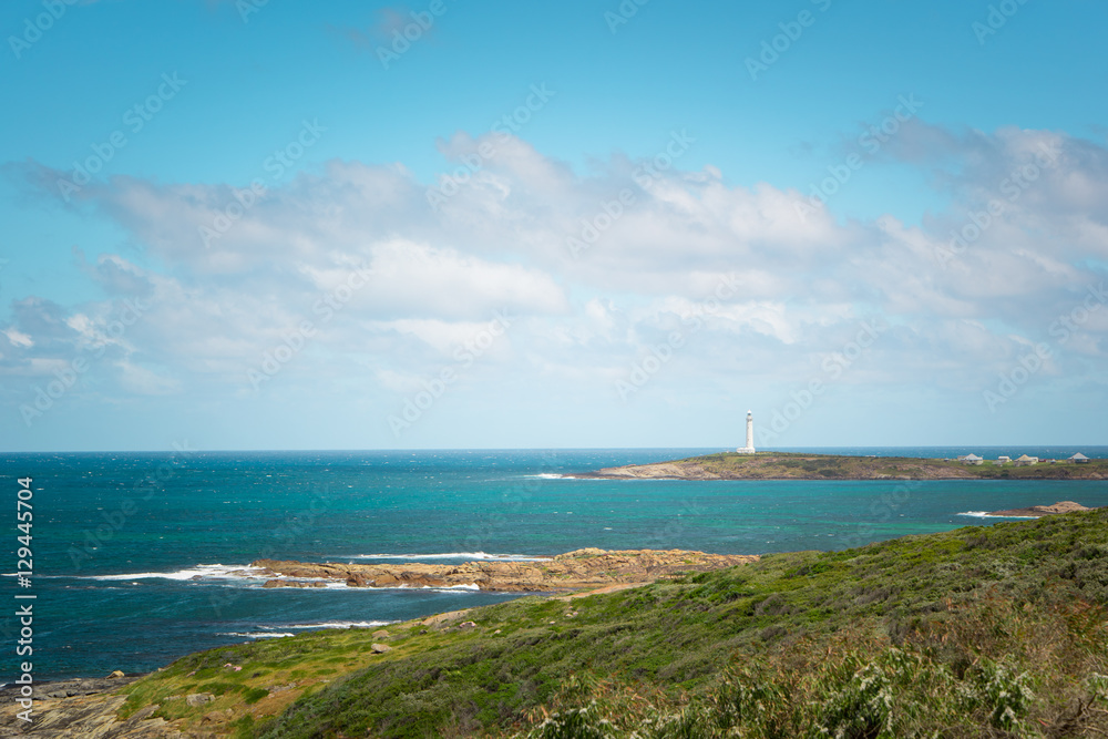 Beach at Cape Leeuwin with the lighthouse in the distance, Augusta Western Australia .