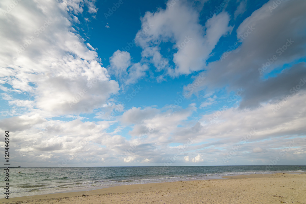 The Indian Ocean laps gently onto the white sandy shore of beautiful beach near Busselton, South Wes