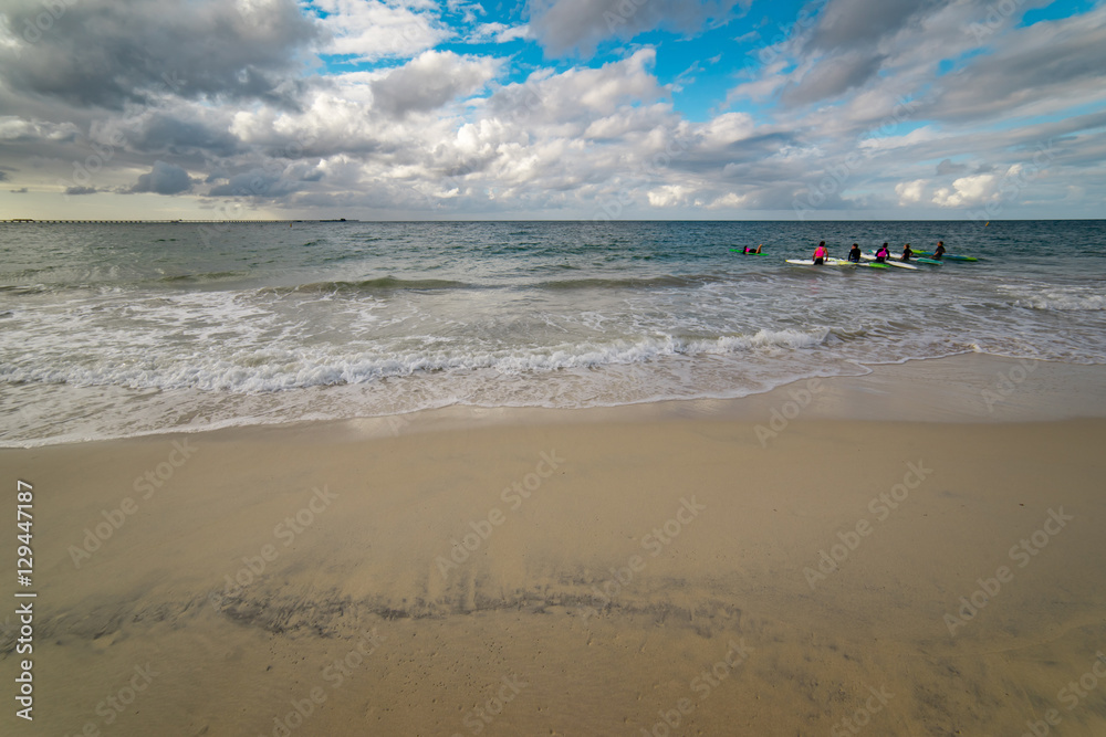 The Indian Ocean laps gently onto the white sandy shore of beautiful beach near Busselton, South Wes