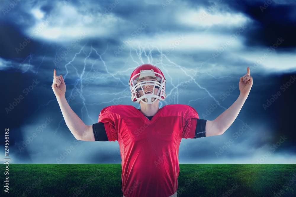 Composite image of american football player triumphing 