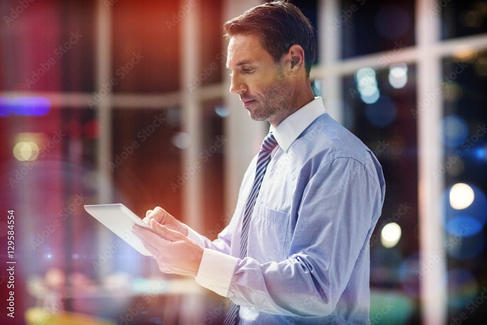 Businessman using digital tablet