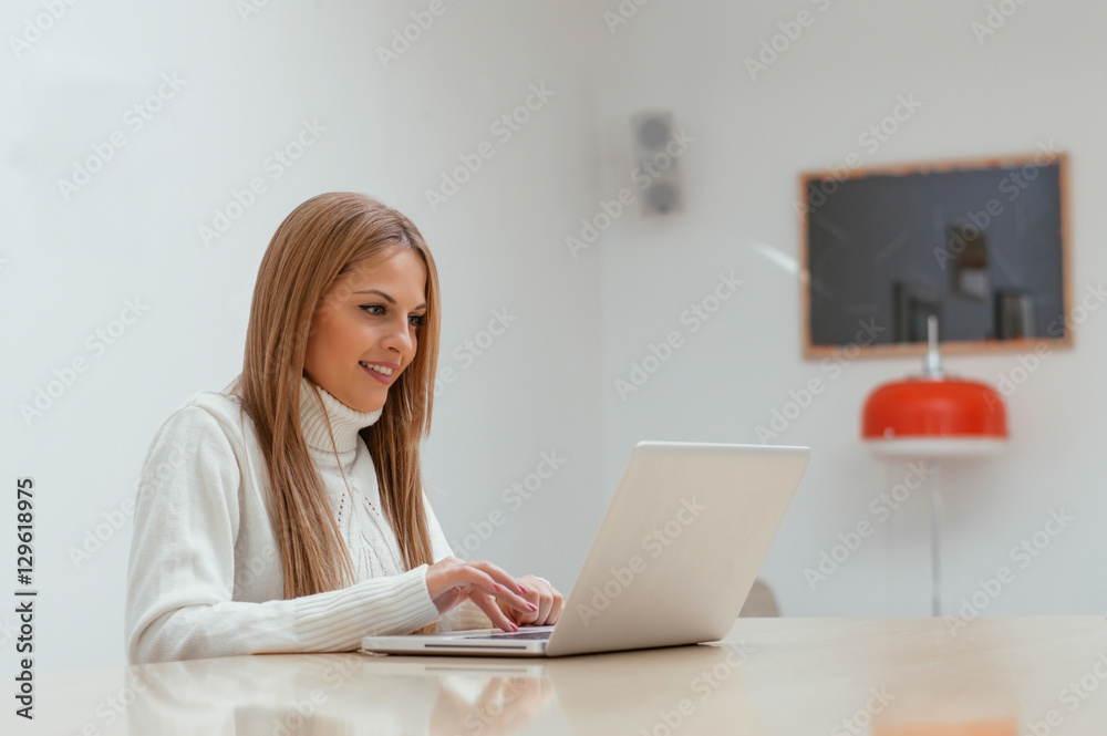 Young woman working from home