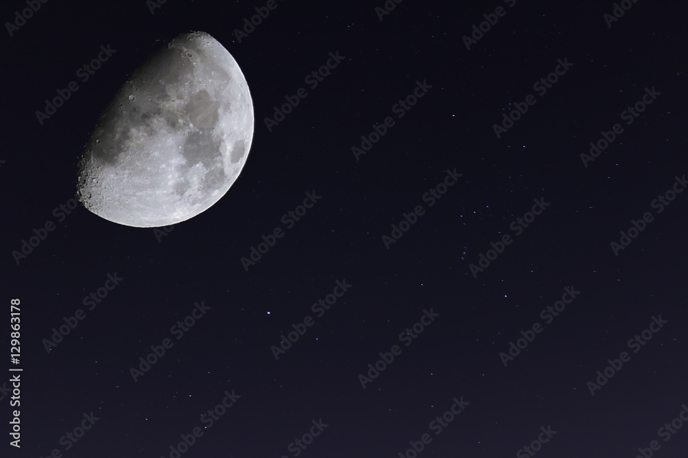 white moon and shiny stars background