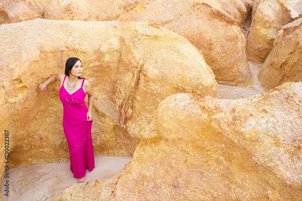 Asian young woman with canyon background. 