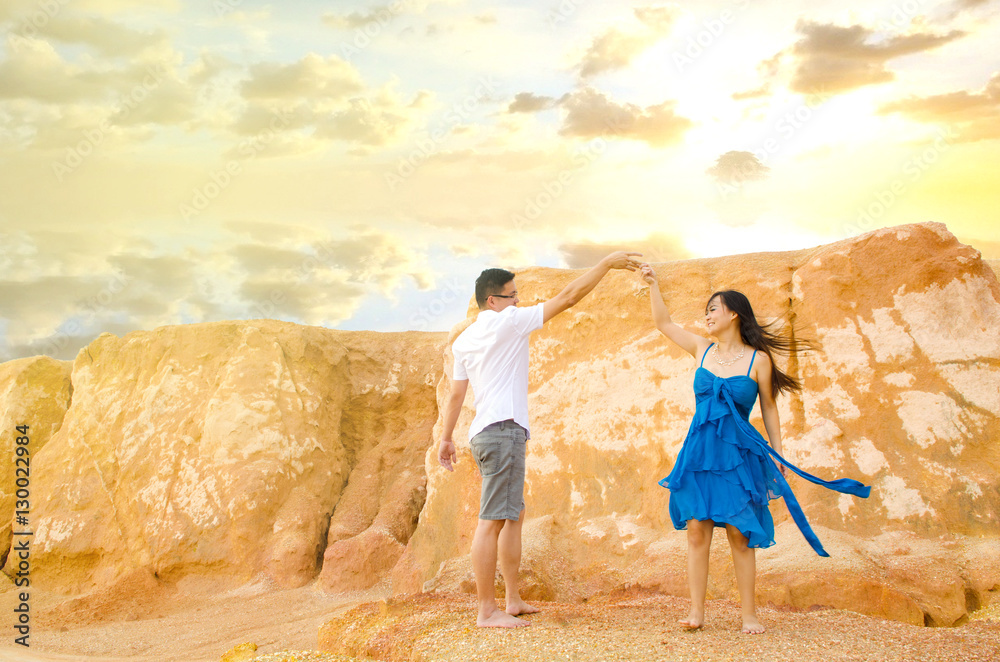 Asian couple hugging with canyon background. Valentines day concept