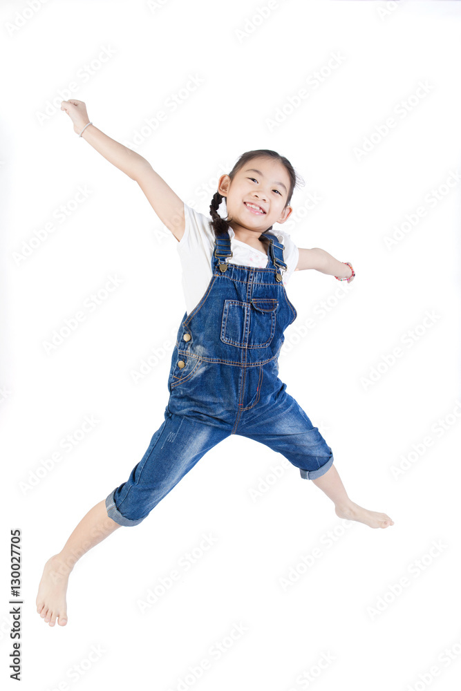 Asian cute child is jumping