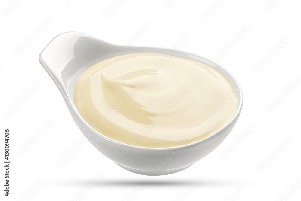 Mayonnaise sauce in bowl isolated on white background