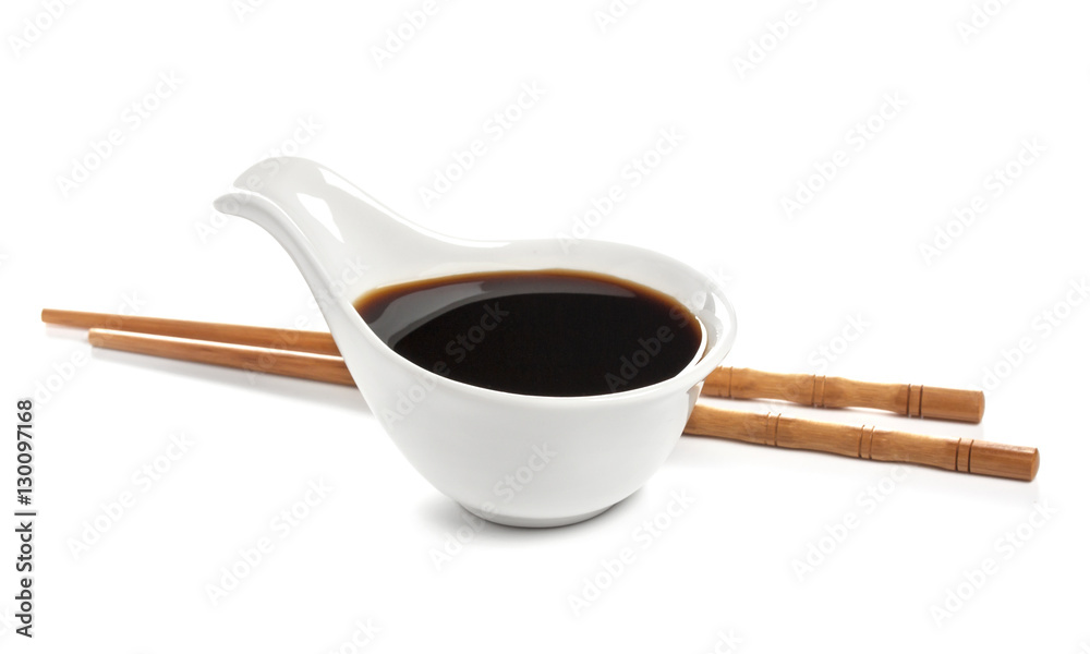 Soy sauce and chopsticks isolated on white background, with clipping path