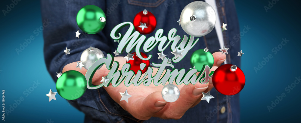 Businessman holding floating christmas message in his hand 3D re