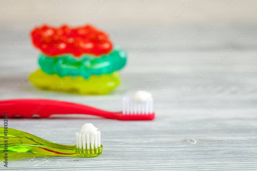 prevention and care childrens teeth wooden background top view