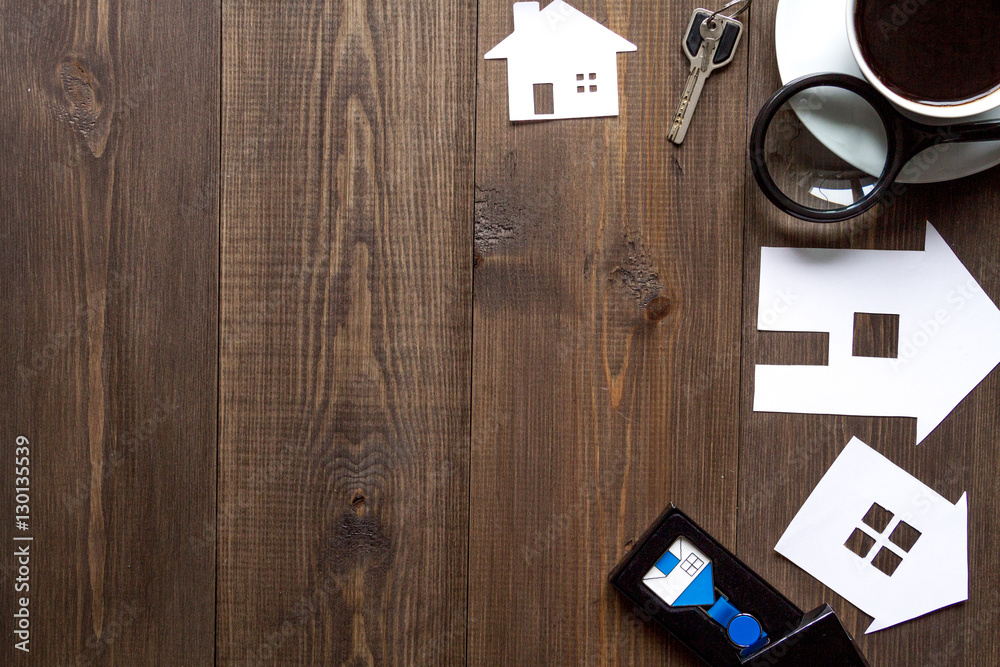 concept of buying house on wooden background top view