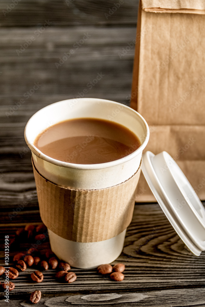 coffee cup take away at wooden background