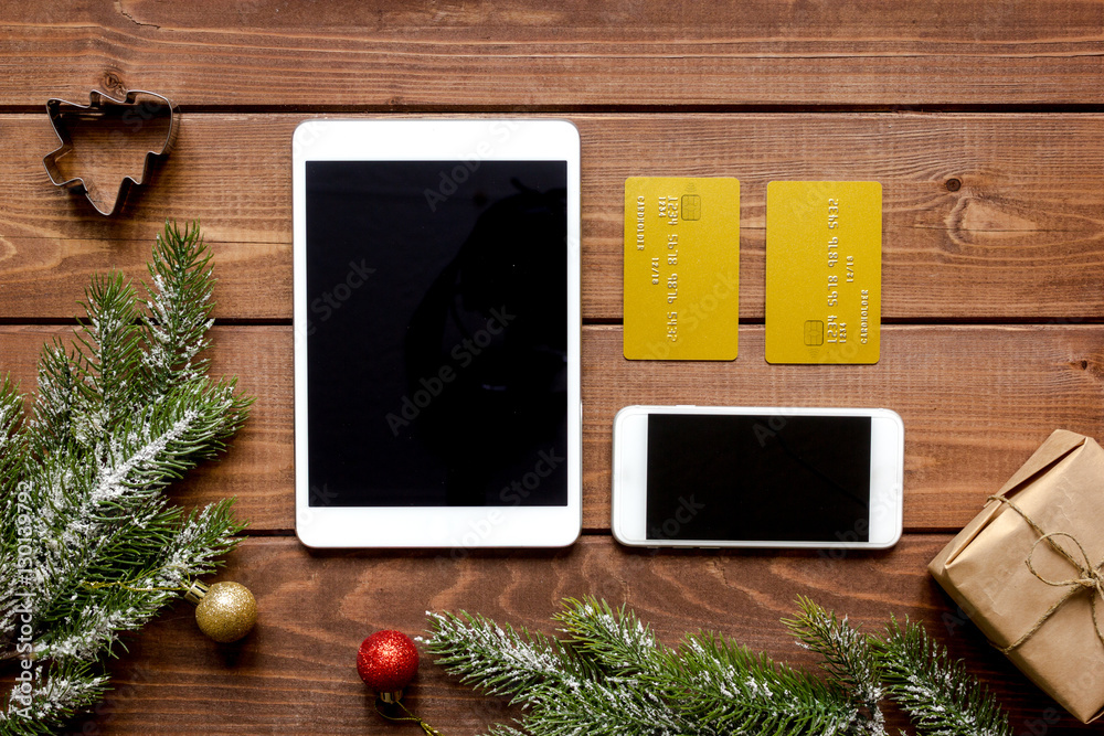 Online shopping for new year on wooden table top view