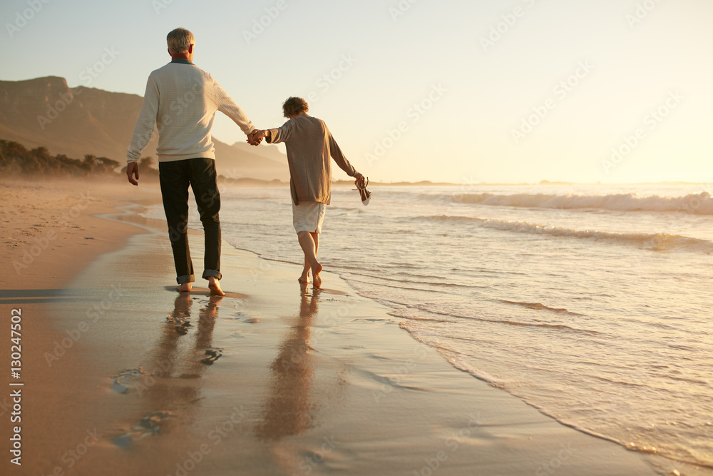 Senior couple having fun at beach