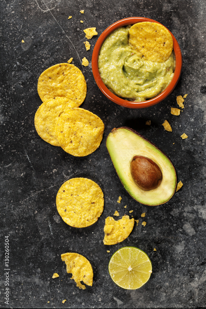 Mexican nachos chips with homemade fresh guacomole sauce