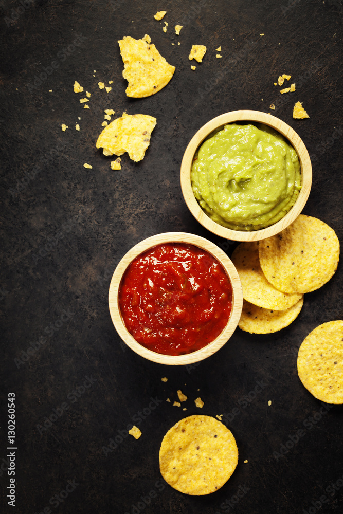 Mexican nachos chips with homemade fresh guacomole sauce and sal