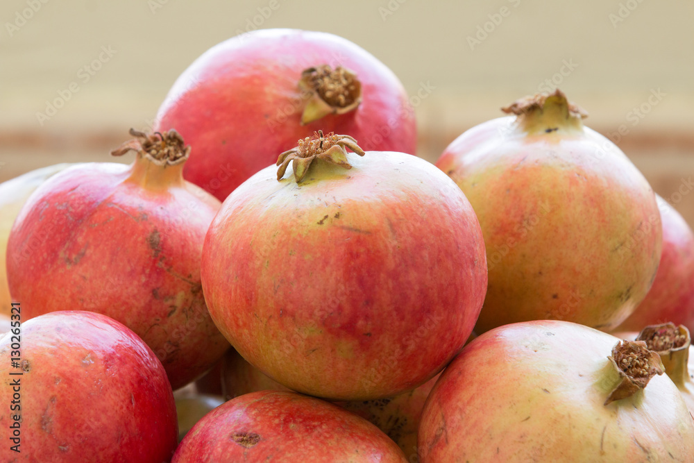 Freshly picked organic pomegranates. Nizwa, Oman.