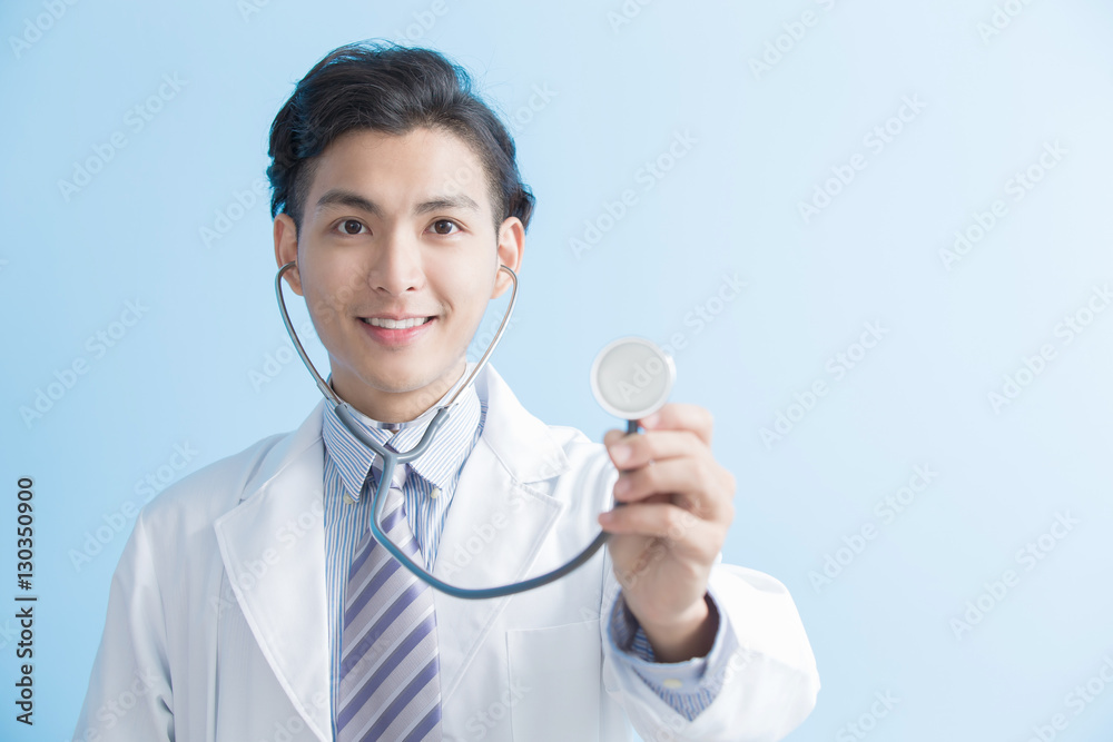 male doctor show stethoscope