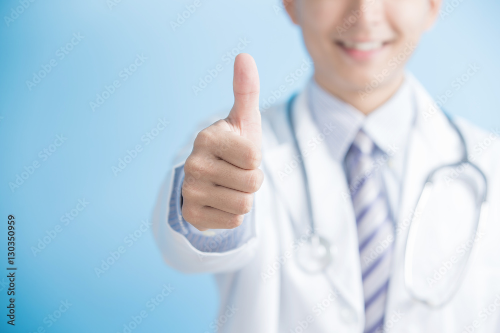 Male doctor show thumb