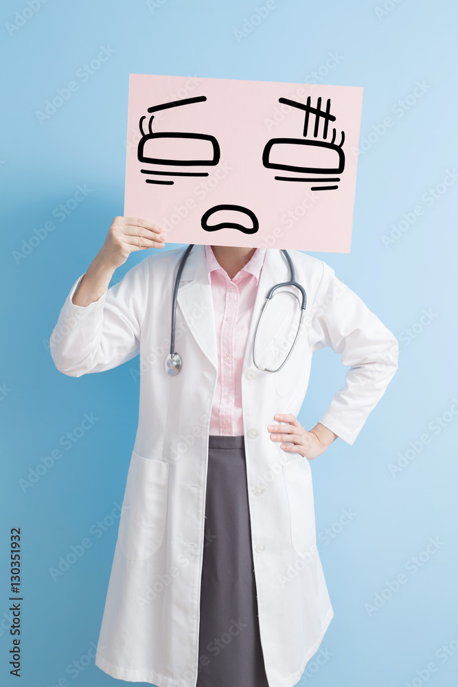 woman doctor show tired billboard