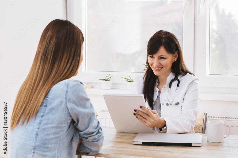 Hospital: Cheerful Doctor Gives Good News To Patient