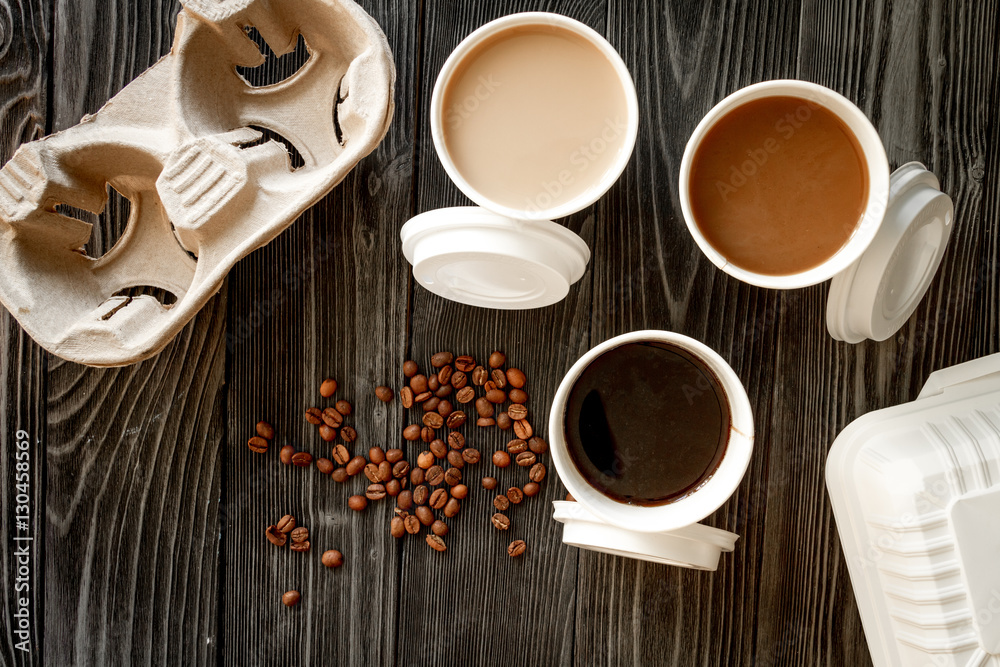 coffee cup take away at wooden background top view