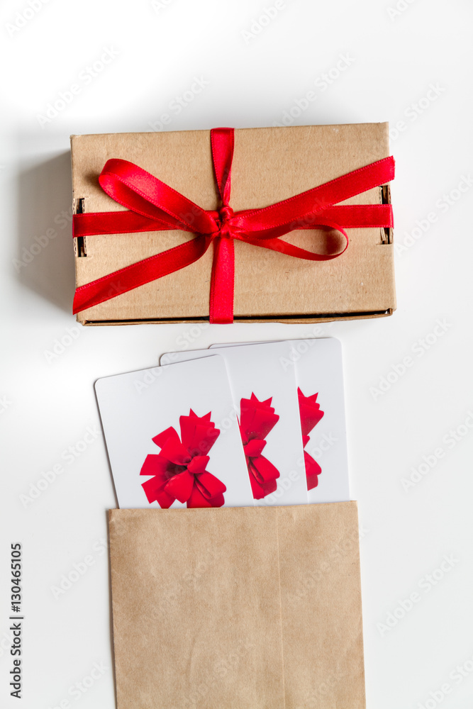 concept of gift cards on white background top view