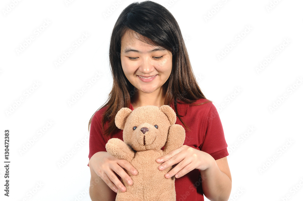 Asian middle woman 30 years old happy with her teddy bear, prese