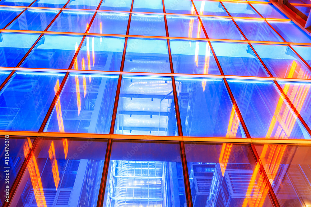 Modern skyscrapers glass wall in the evening