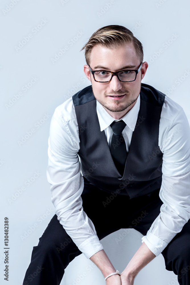 elegant business man with glasses reflects concentrated