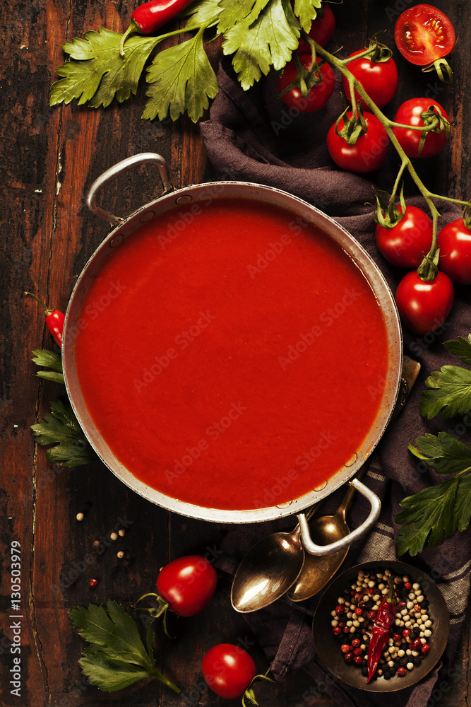 Homemade Tomato soup on wooden table