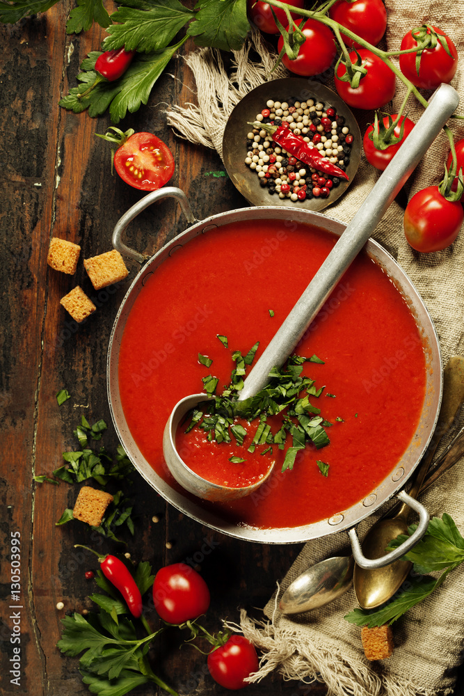 Homemade Tomato soup on wooden table