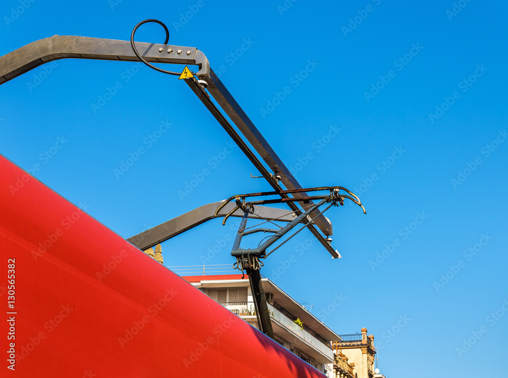 Tram charging itself on a station in Sevilla, Spain