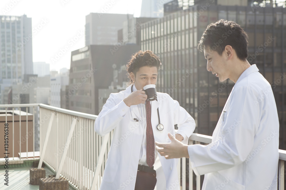 Male doctor is resting on the roof