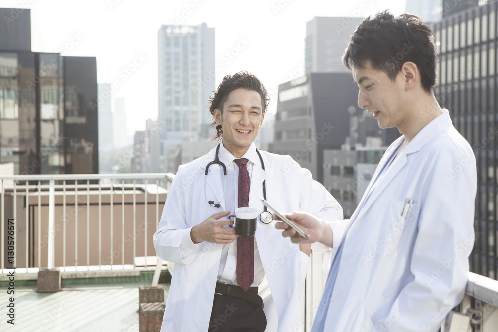 Male doctor is resting on the roof