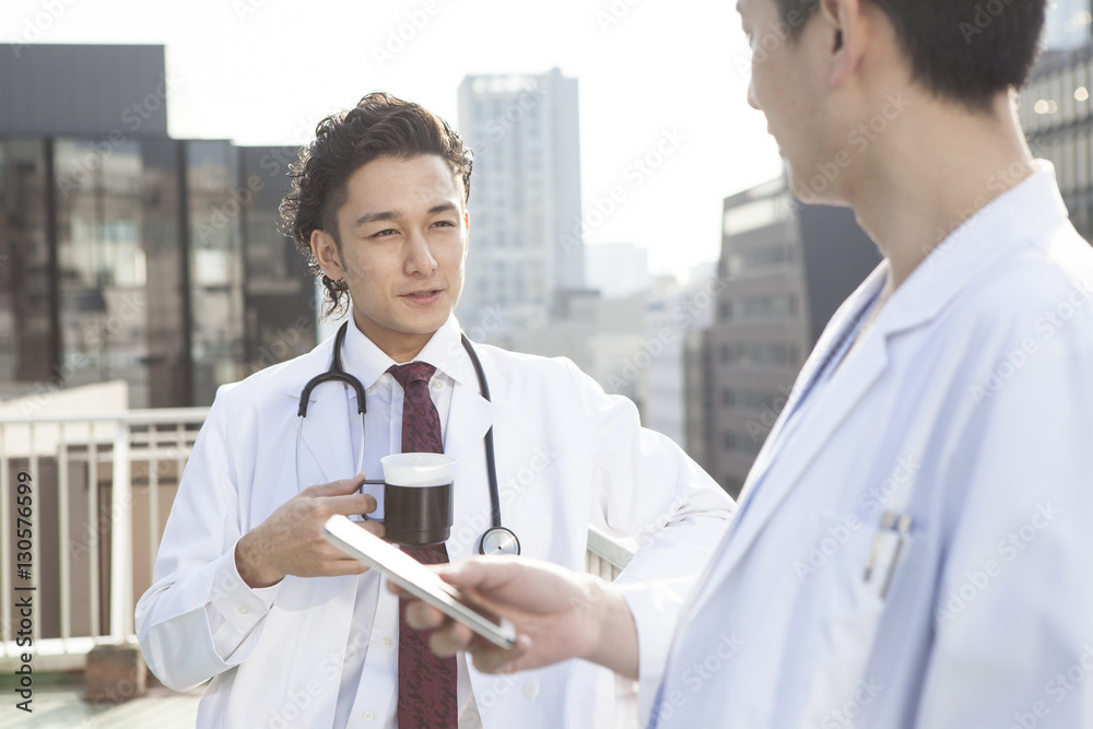 Male doctor is resting on the roof