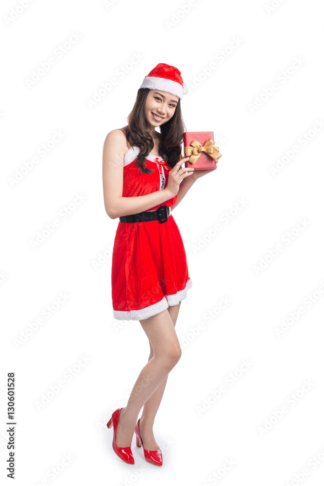 Full length portrait of a asian woman in santa claus cloth holdi